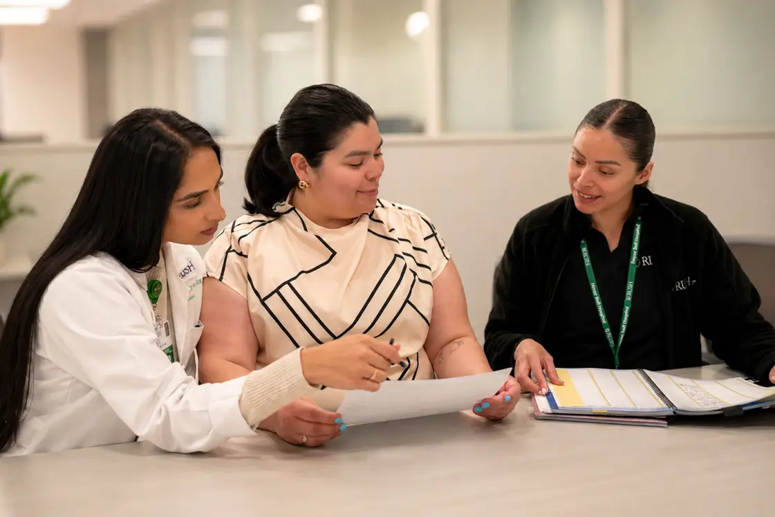 Members of the multidisciplinary movement disorders team in discussion