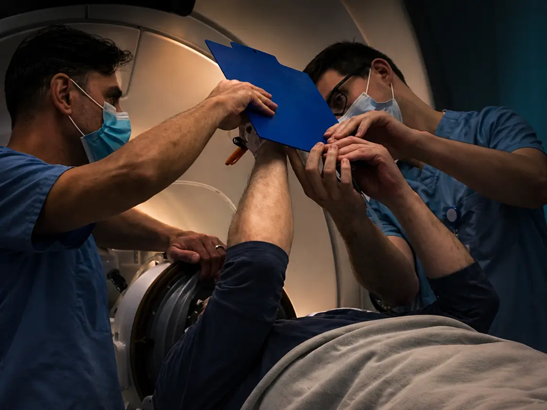 The team monitoring an MRI-guided focused ultrasound treatment in real time