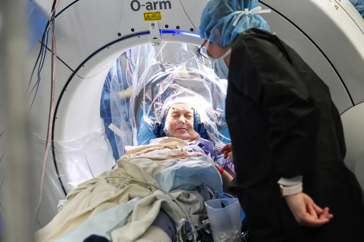 A patient awake and comfortable inside the intraoperative scanner during DBS surgery