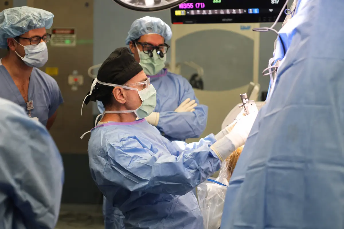 The neurosurgical team at the operating table during a DBS procedure